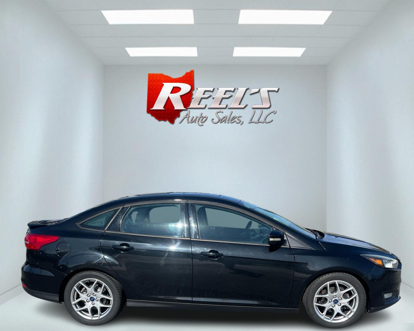 2015 Black /Black Ford Focus SE Sedan (1FADP3F27FL) with an 2.0L I4 DOHC 16V engine, 6-Speed Automatic transmission, located at 11115 Chardon Rd. , Chardon, OH, 44024, (440) 214-9705, 41.580246, -81.241943 - Photo#4